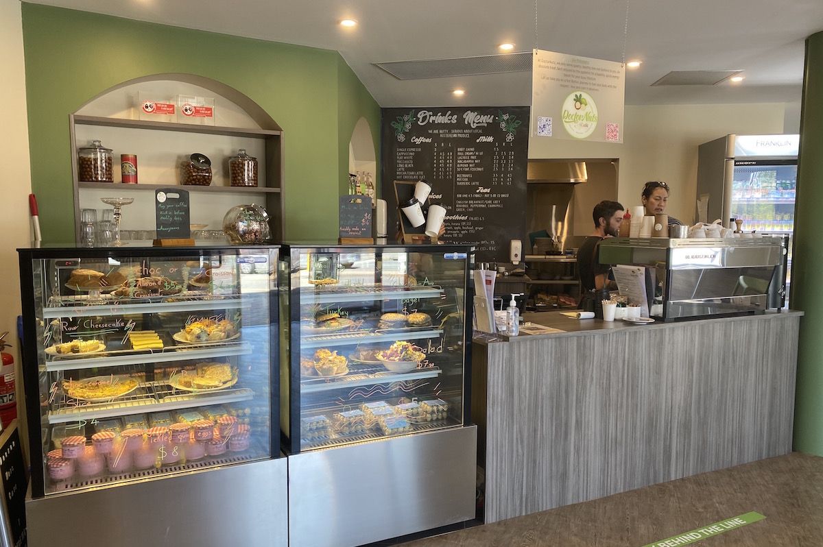 the coffee machine and counter with healthy food items at DoctorNuts cafe in Subiaco